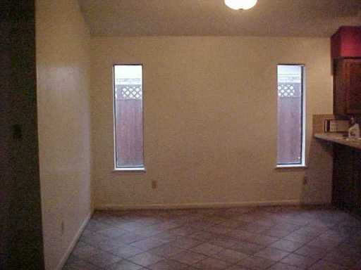 4947 Elm Hurst Lane Corpus Christi, TX 78413 - Photo 6 of 10 a view of an empty room with a window