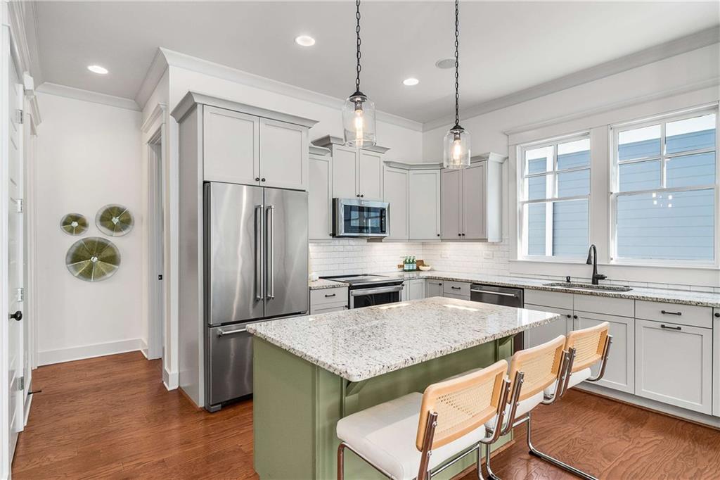 2003 Hibernia Bend Decatur, GA 30030 - Photo 13 of 52 a kitchen with a refrigerator a sink and cabinets