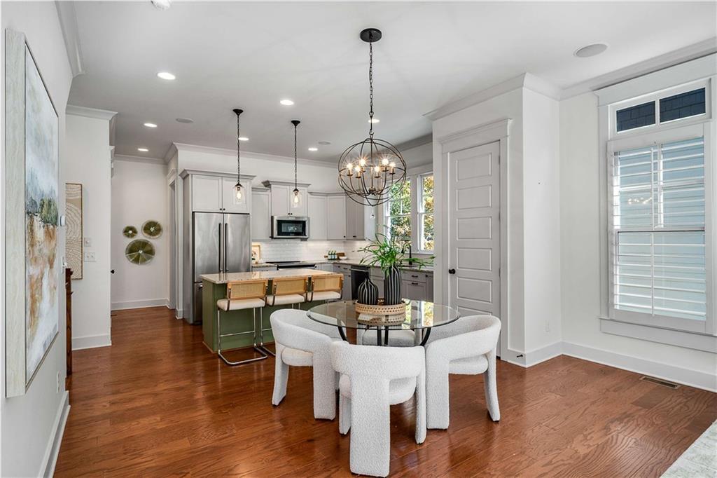 2003 Hibernia Bend Decatur, GA 30030 - Photo 16 of 52 a dining room with furniture and wooden floor