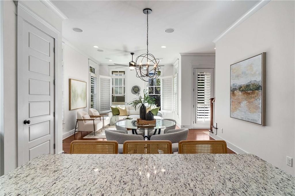 2003 Hibernia Bend Decatur, GA 30030 - Photo 18 of 52 a living room with kitchen island furniture and a chandelier