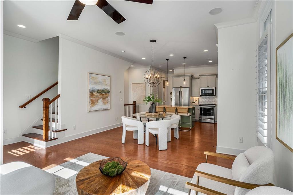 2003 Hibernia Bend Decatur, GA 30030 - Photo 21 of 52 a living room with furniture kitchen view and a chandelier