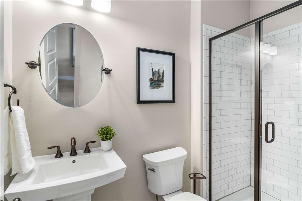 2003 Hibernia Bend Decatur, GA 30030 - Photo 25 of 52 a bathroom with a toilet sink and mirror