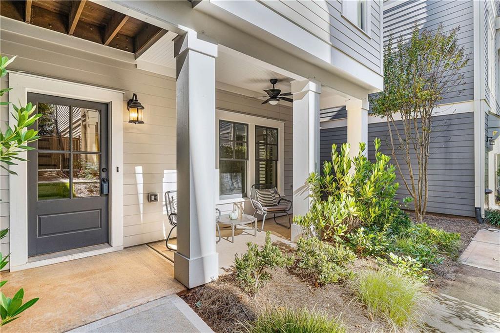 2003 Hibernia Bend Decatur, GA 30030 - Photo 3 of 52 a view of a porch with chairs and potted plants