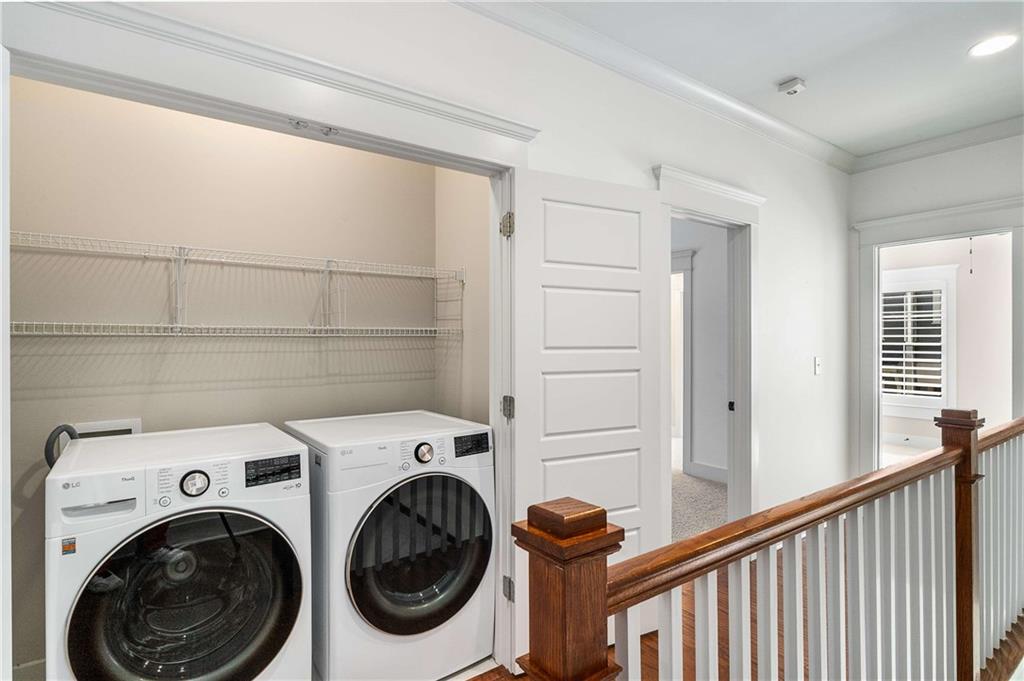2003 Hibernia Bend Decatur, GA 30030 - Photo 31 of 52 a view of storage and utility room with washer and dryer