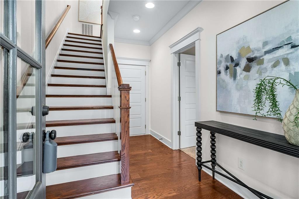 2003 Hibernia Bend Decatur, GA 30030 - Photo 7 of 52 a view of entryway with wooden floor and stairs
