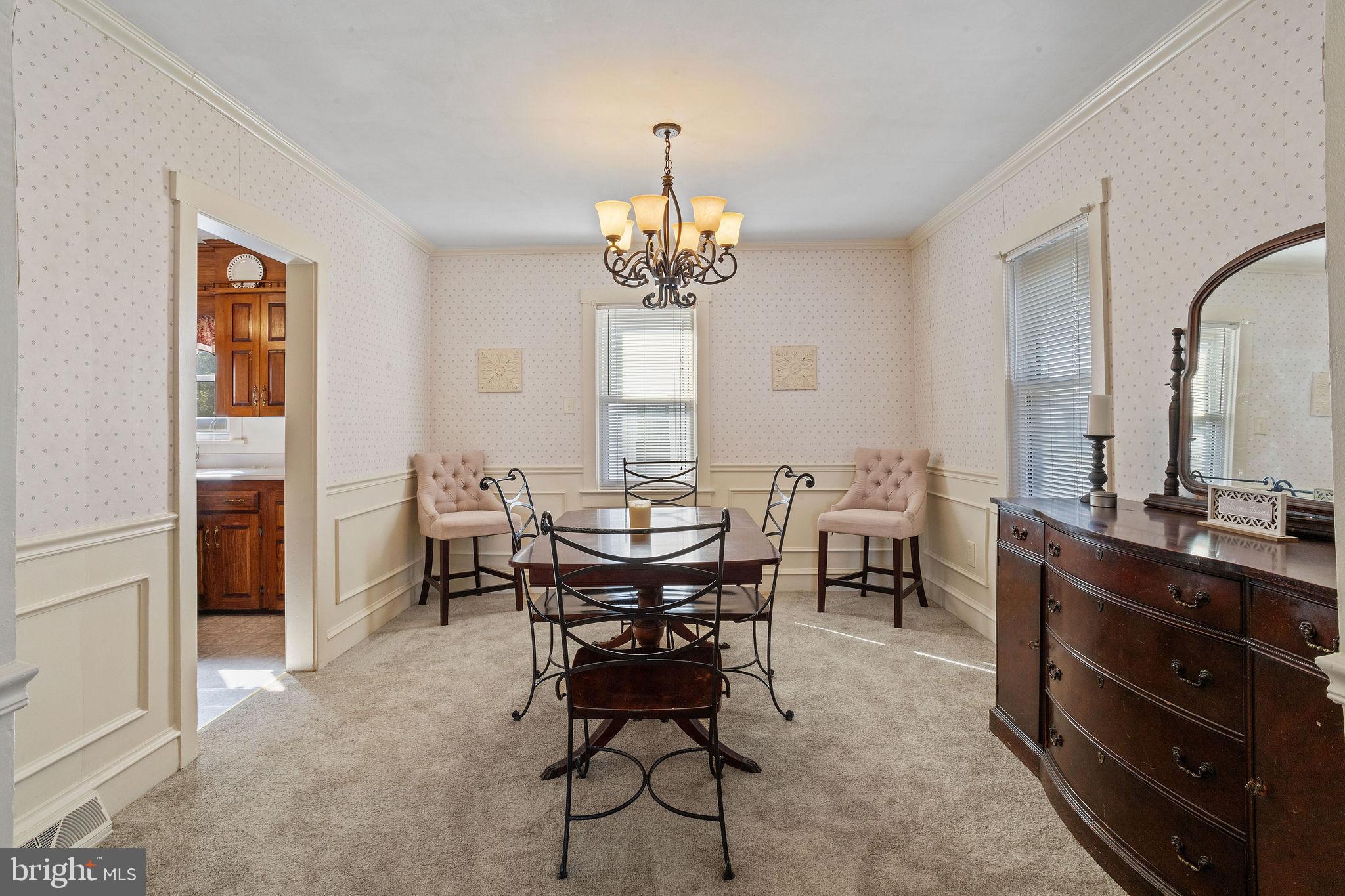 57 South Dupont Road Carneys Point, NJ 08069 - Photo 8 of 26 Formal dining room is open and bright.