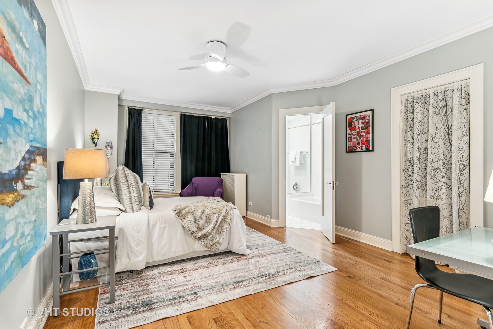 3100 North Sheridan Road, Unit 8B Chicago, IL 60657 - Photo 17 of 28 a bedroom with a bed and wooden floor