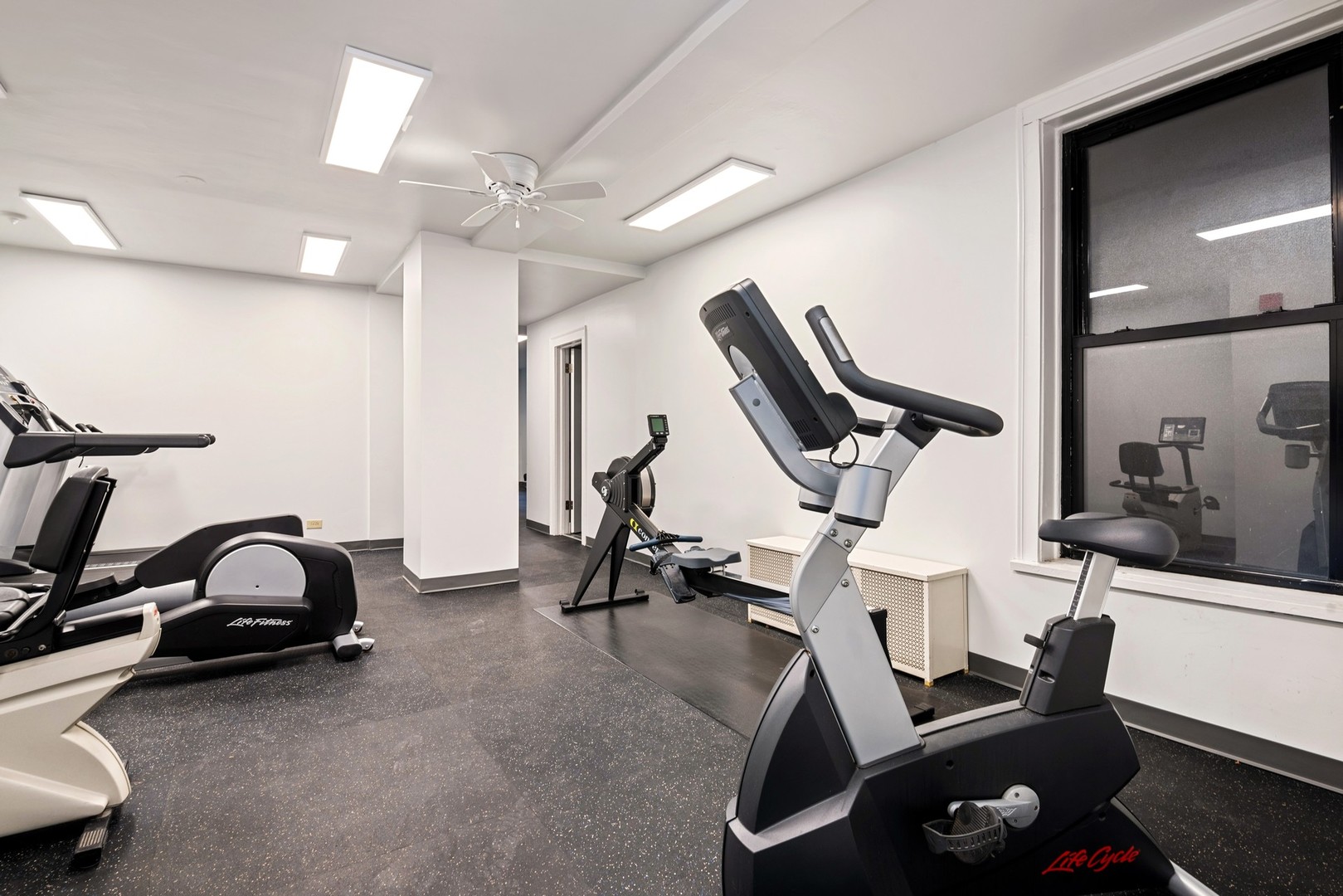 3100 North Sheridan Road, Unit 8B Chicago, IL 60657 - Photo 26 of 28 a view of a room with gym equipment