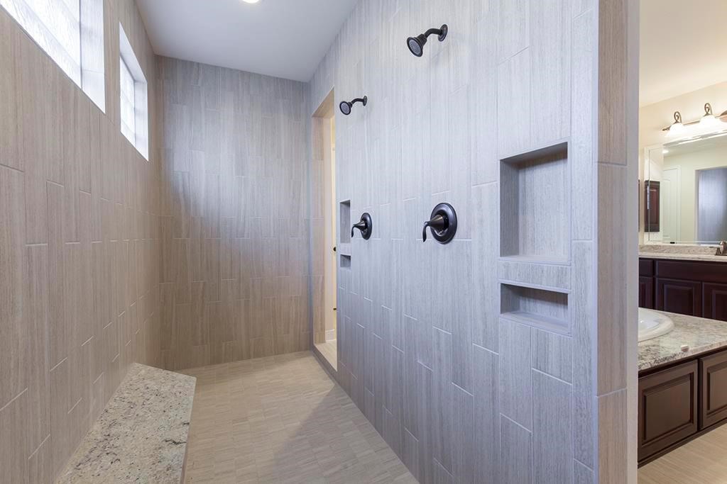 10402 Southern Hawker Conroe, TX 77385 - Photo 12 of 22 a view of a bathroom from the hallway