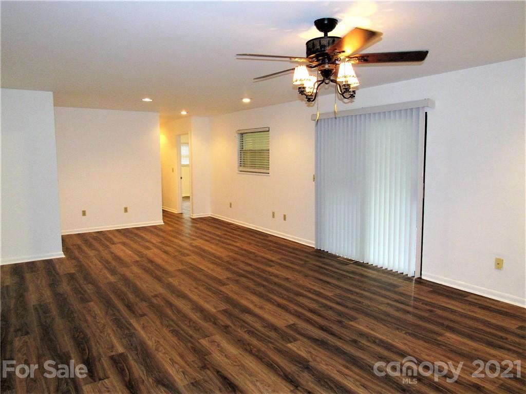 2506 Hemphill Road Waynesville, NC 28785 - Photo 6 of 37 a view of empty room with wooden floor