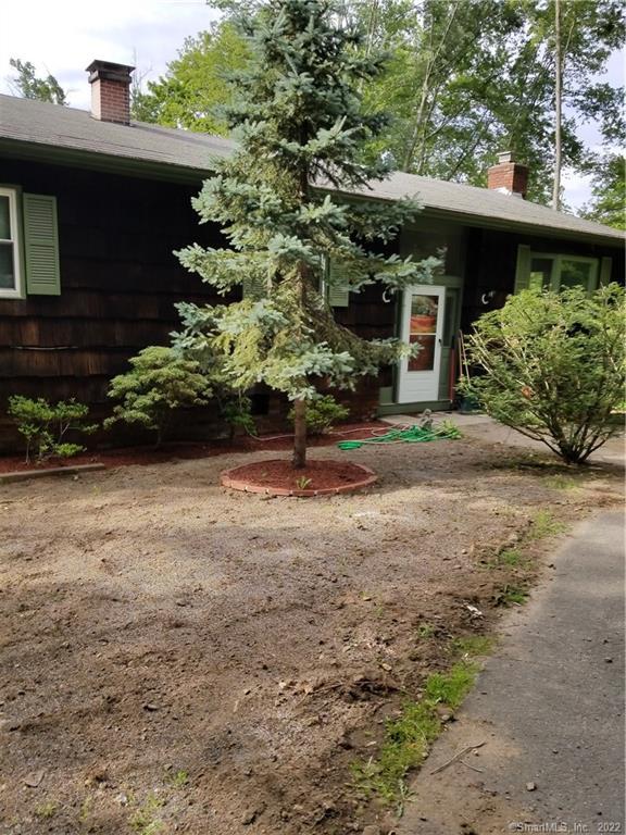 63 Dodgingtown Road Bethel, CT 06801 - Photo 1 of 1 a view of a back yard of the house