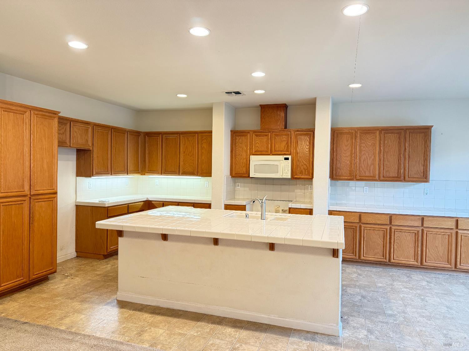 338 Gold Hills Drive Rio Vista, CA 94571 - Photo 2 of 27 a kitchen with stainless steel appliances granite countertop a sink a stove and a refrigerator