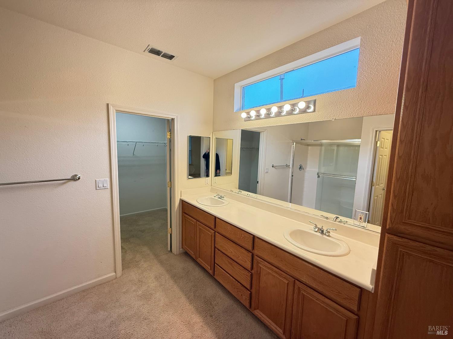 338 Gold Hills Drive Rio Vista, CA 94571 - Photo 4 of 27 a bathroom with a sink a mirror and a shower