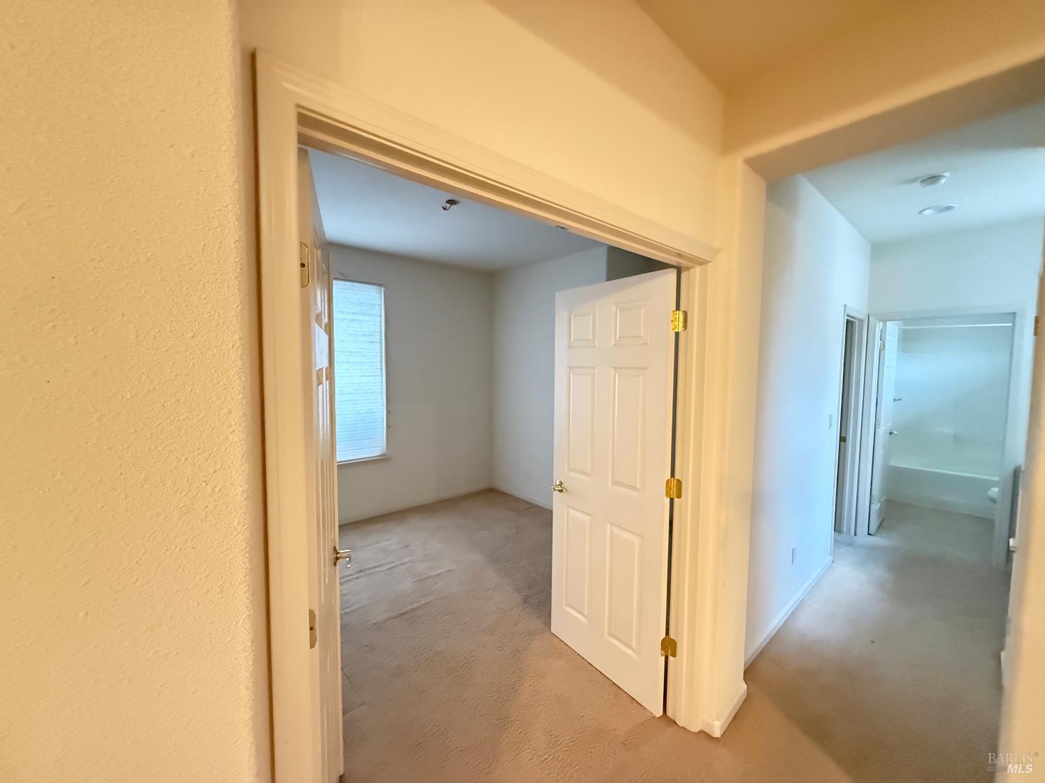 338 Gold Hills Drive Rio Vista, CA 94571 - Photo 7 of 27 a view of a hallway with wooden floor