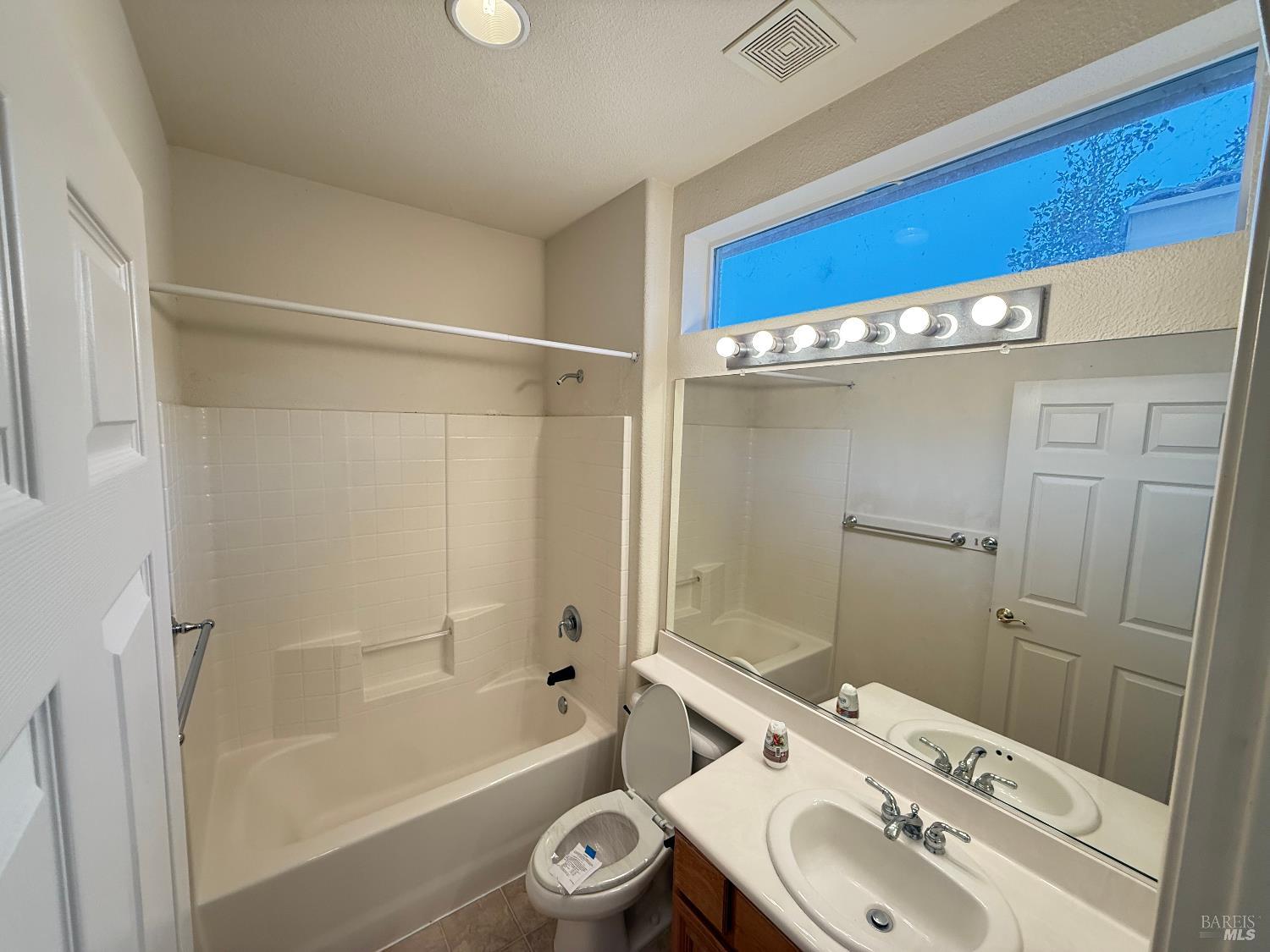 338 Gold Hills Drive Rio Vista, CA 94571 - Photo 9 of 27 a bathroom with a sink a toilet and shower