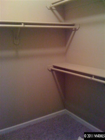 900 S Meadows, Unit 2423 Reno, NV 89521 - Photo 5 of 11 a view of a room with shelf