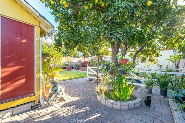 a view of a small yard in front of a house