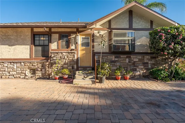 a view of house with outdoor space