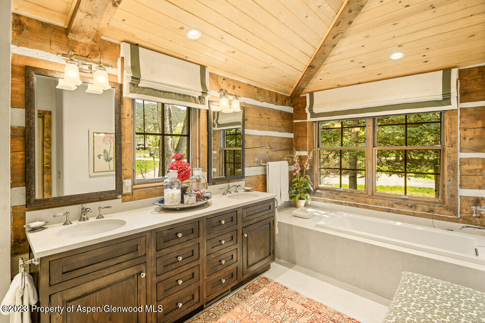 26 Altamira Ranch Road Basalt, CO 81621 - Photo 15 of 40 a bathroom with a tub sink shower and mirror