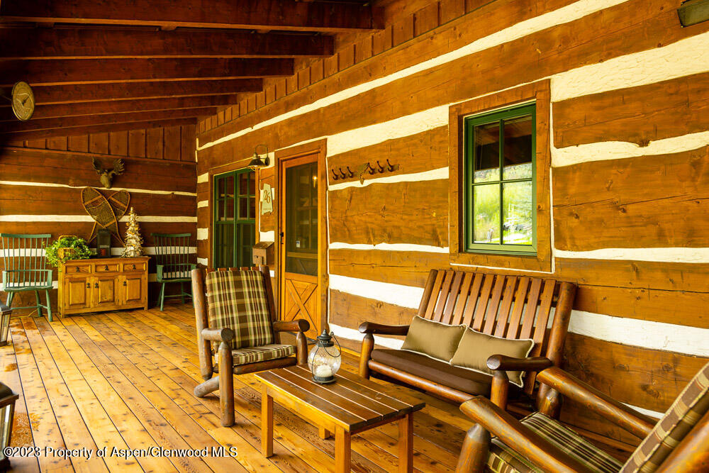 26 Altamira Ranch Road Basalt, CO 81621 - Photo 25 of 40 a view of a chairs and table on the patio