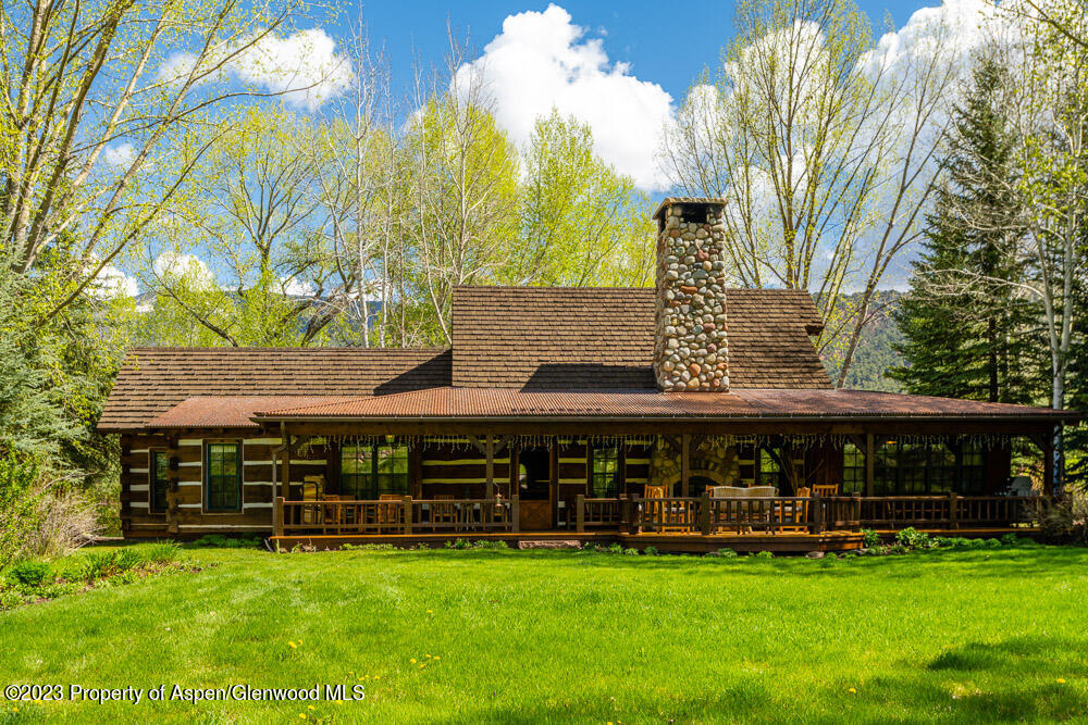 26 Altamira Ranch Road Basalt, CO 81621 - Photo 31 of 40 a view of a house with a yard