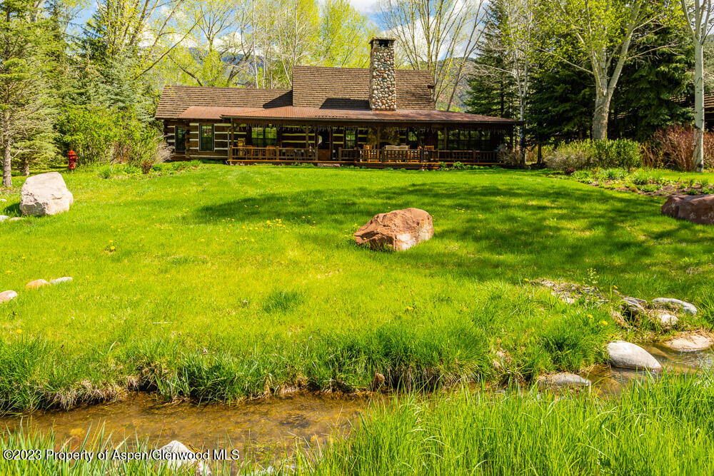 26 Altamira Ranch Road Basalt, CO 81621 - Photo 33 of 40 a view of a house with a big yard