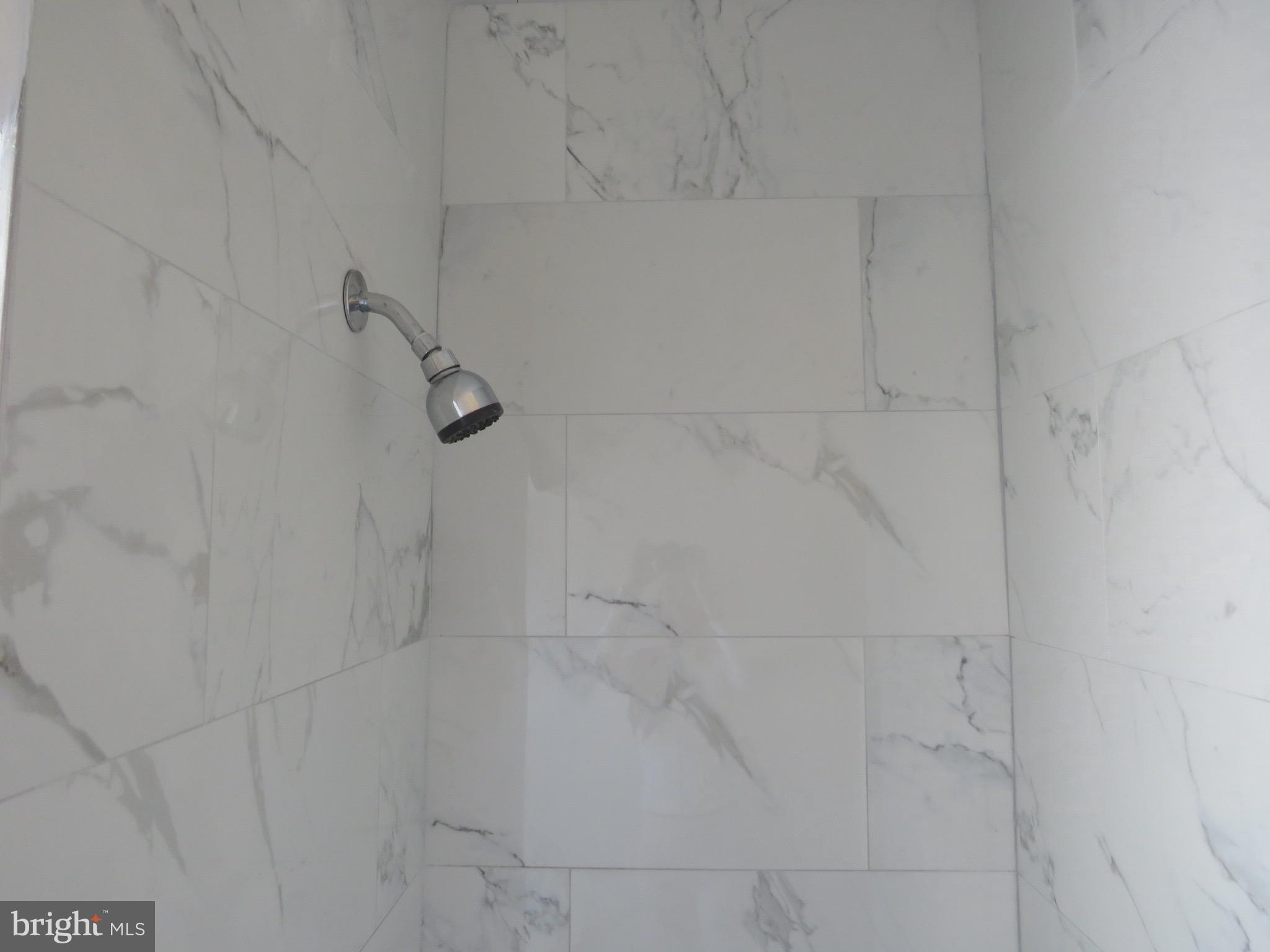 356 East Walnut Lane, Unit 3 Philadelphia, PA 19144 - Photo 10 of 18 a close view of a bathtub in bathroom