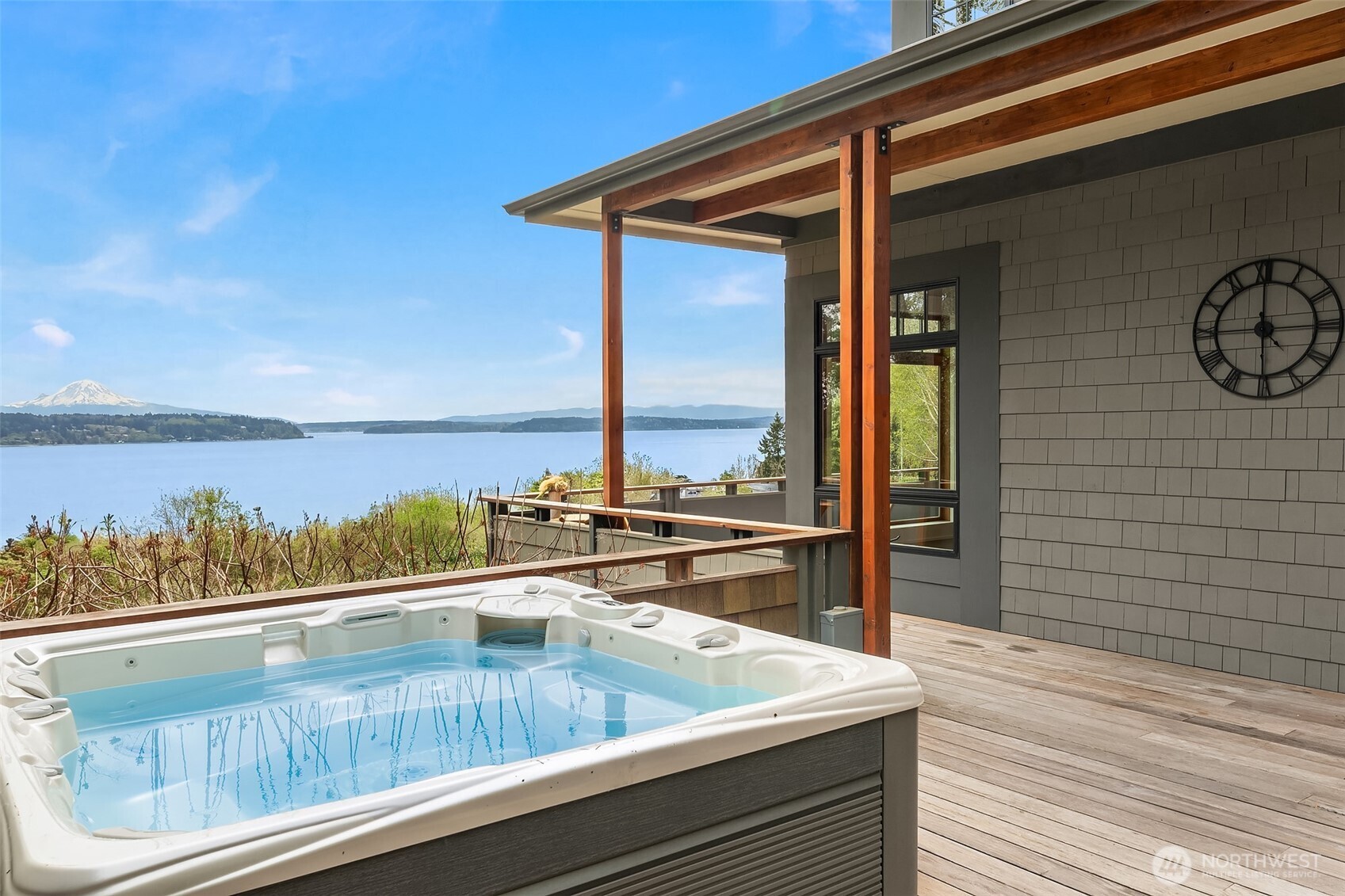 8302 Southwest Dilworth Road Vashon, WA 98070 - Photo 31 of 40 a view of a balcony with wooden floor and outdoor space