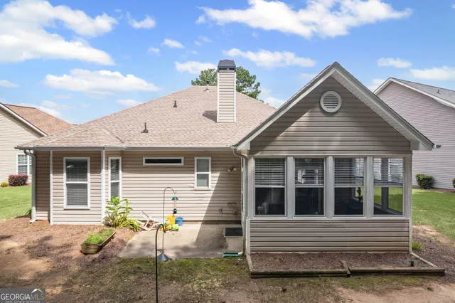 a view of house with outdoor space