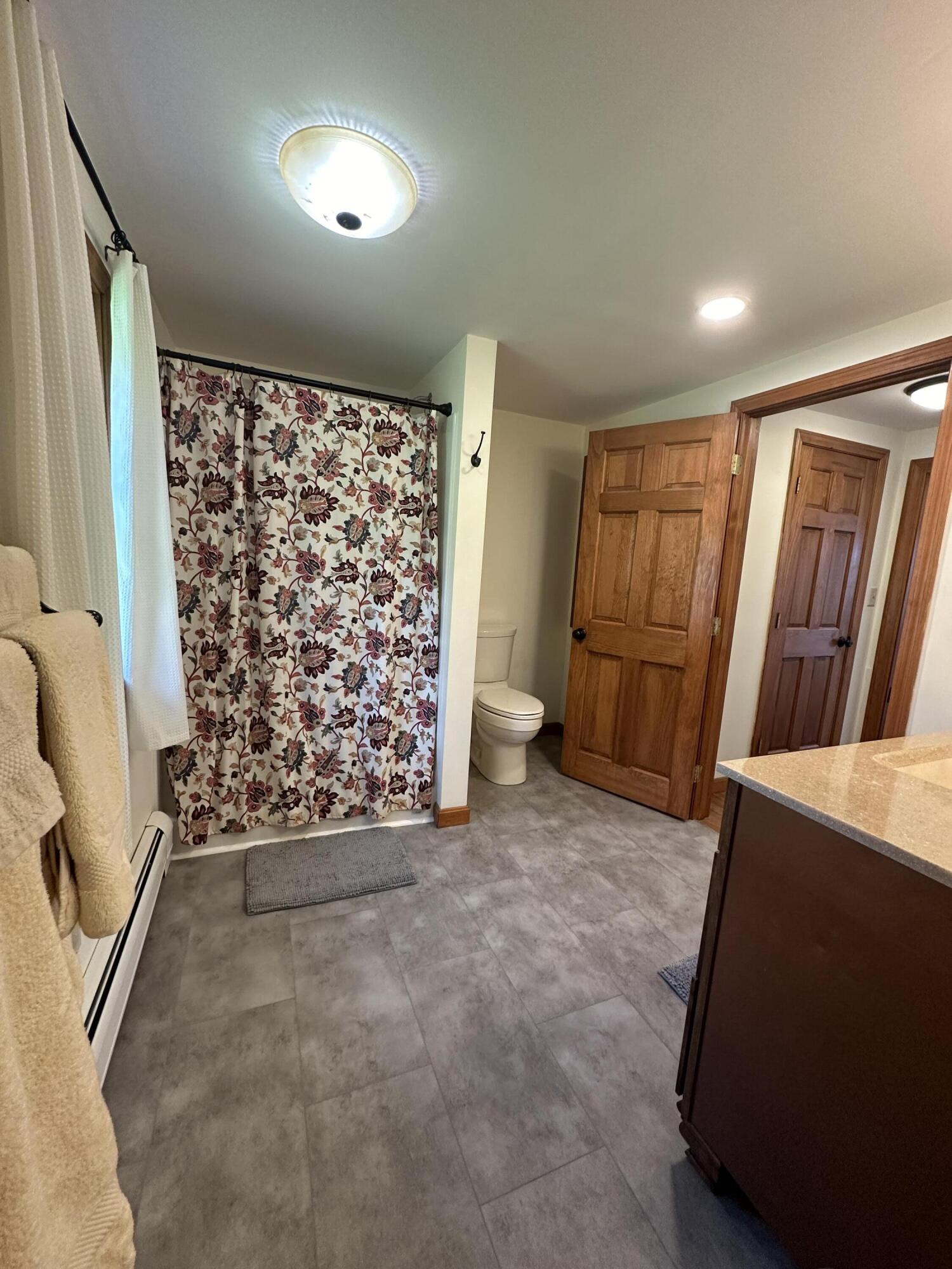 338 Johnson Cove Road Roque Bluffs, ME 04654 - Photo 24 of 49 1st Floor Bathroom from Bedroom