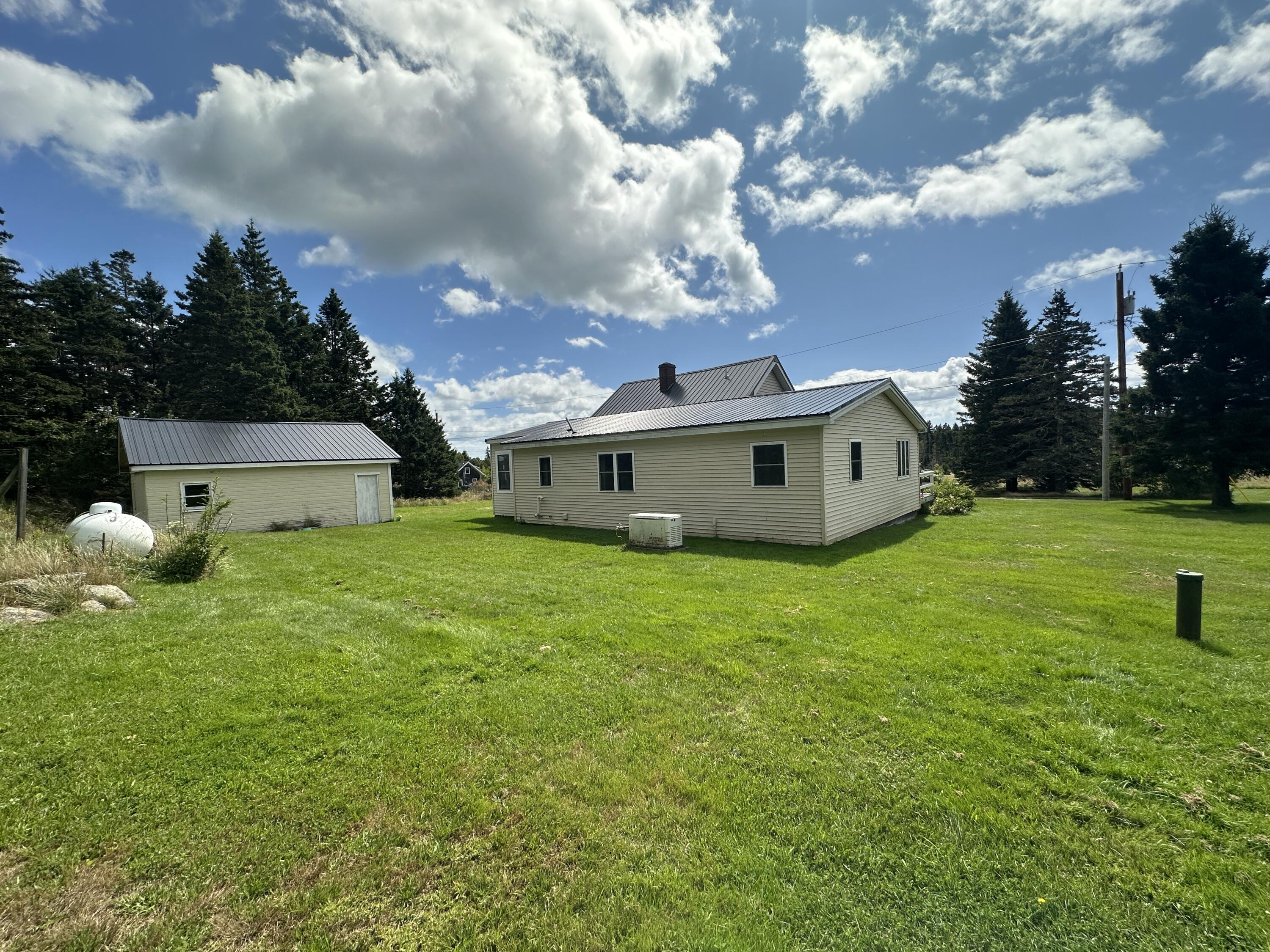 338 Johnson Cove Road Roque Bluffs, ME 04654 - Photo 40 of 49 Back of House_Side of Garage