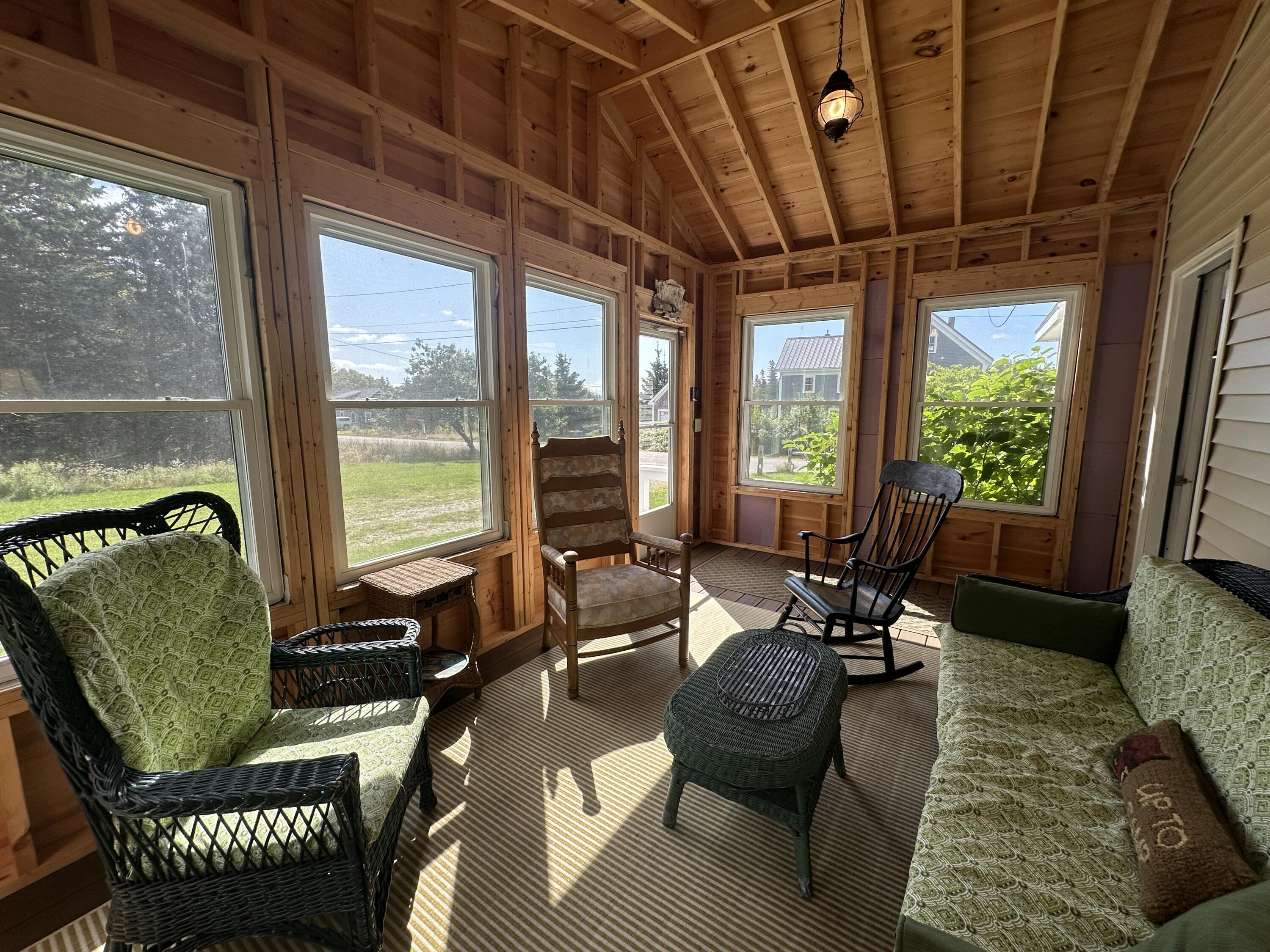 338 Johnson Cove Road Roque Bluffs, ME 04654 - Photo 7 of 49 Sunroom from Corner