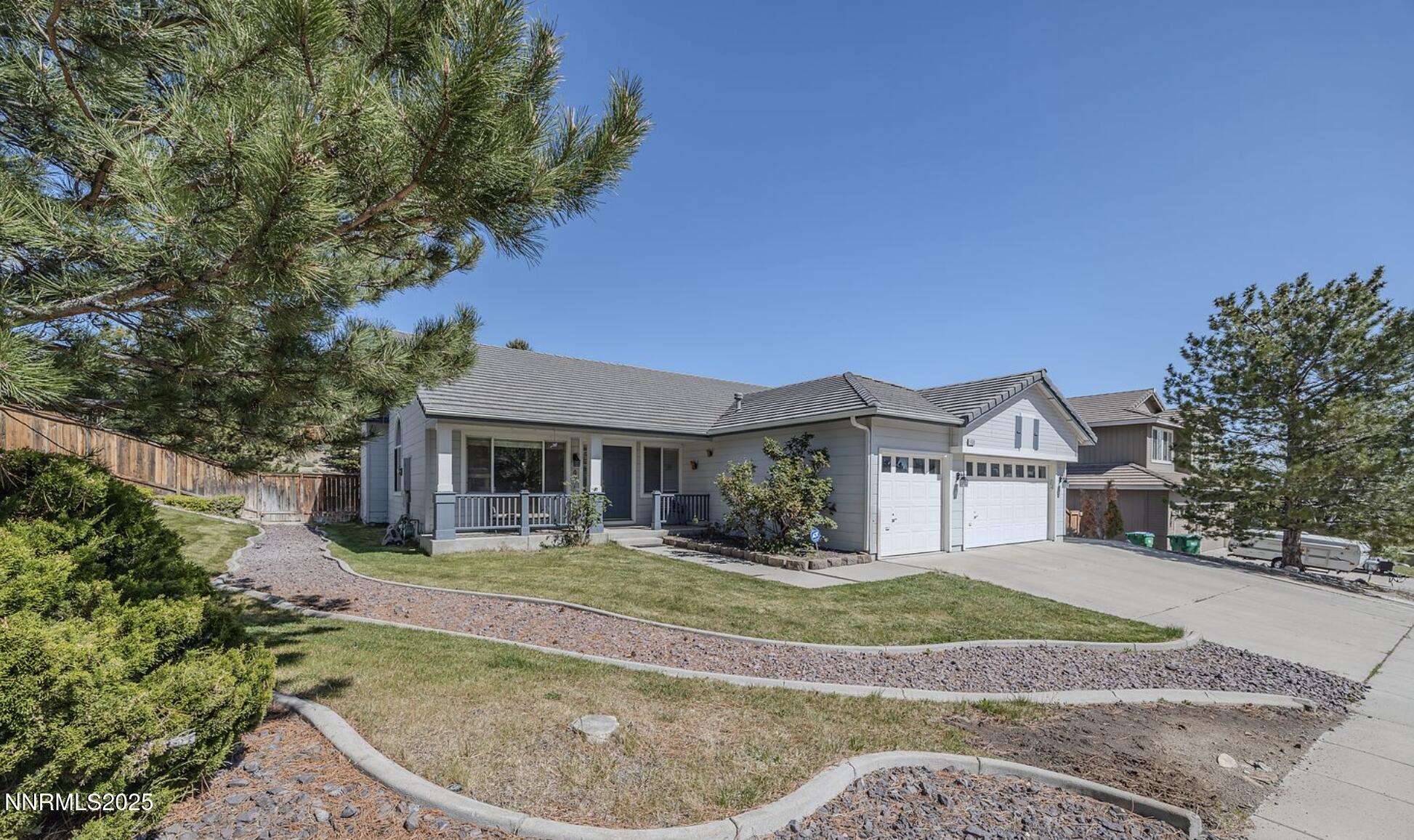 4080 Twin Falls Drive Reno, NV 89511 - Photo 2 of 16 front view of a house with a yard