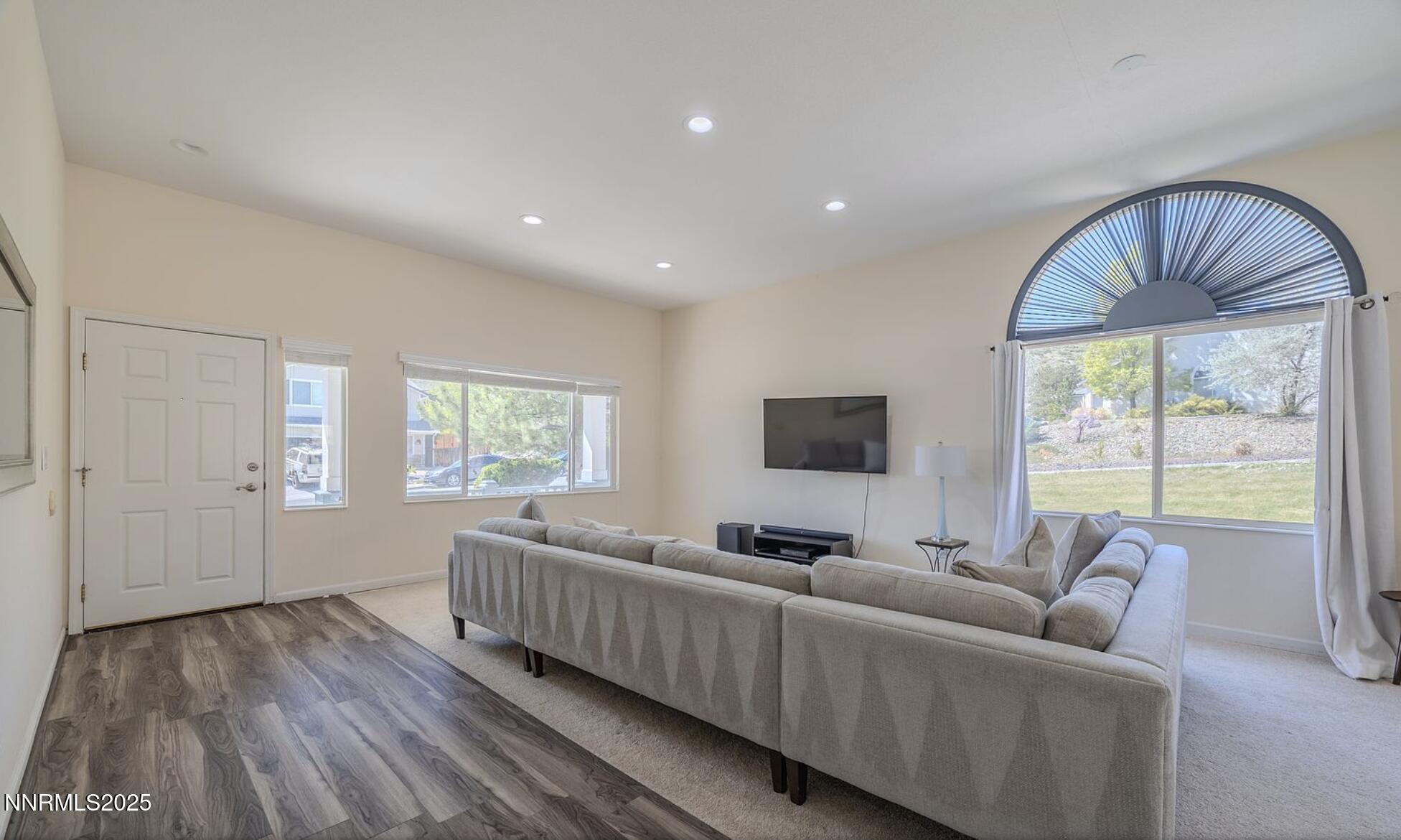 4080 Twin Falls Drive Reno, NV 89511 - Photo 3 of 16 a living room with furniture and a flat screen tv