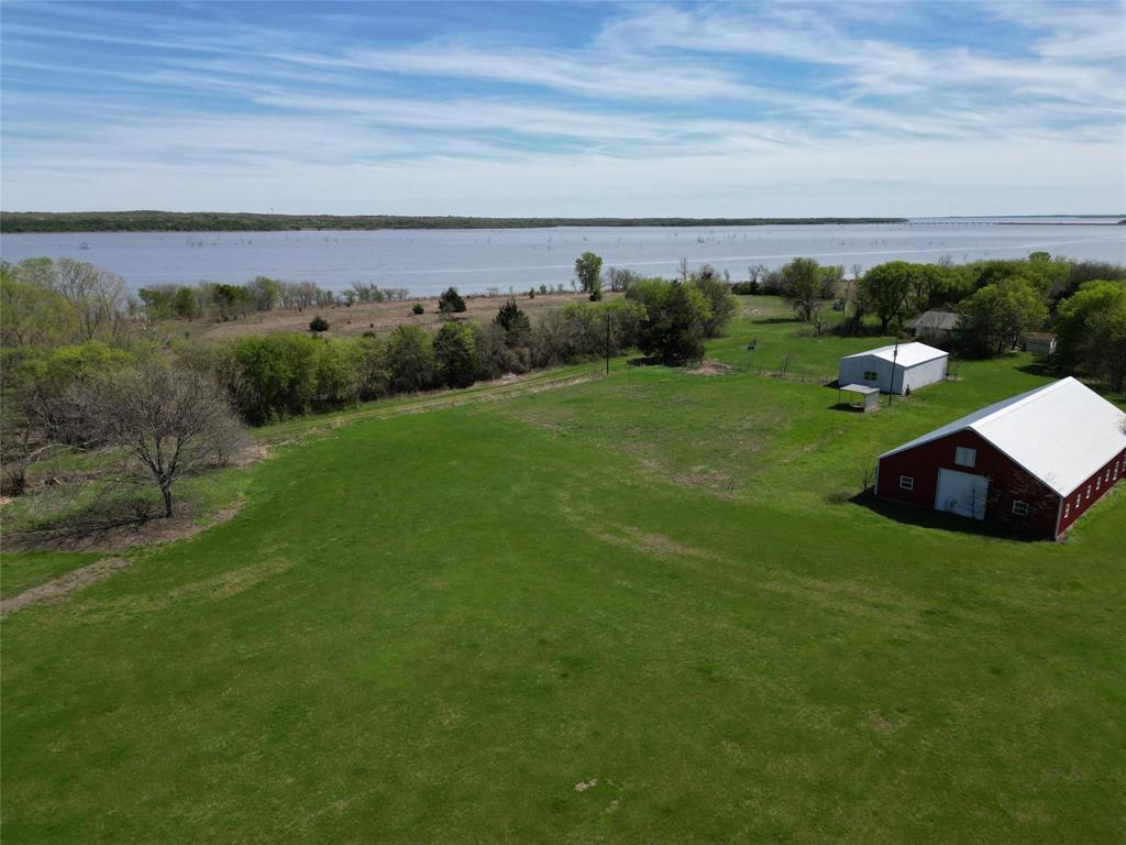 2109 Triangle Road Valley View, TX 76272 - Photo 5 of 7 Drone / aerial view of a large body of water
