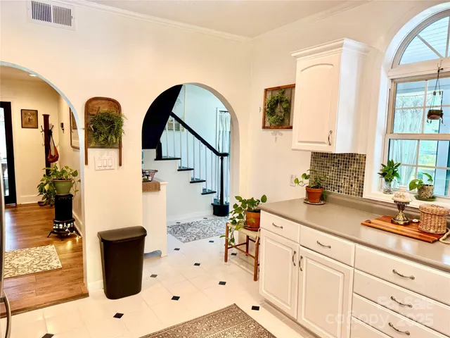 a bathroom with a sink and mirror