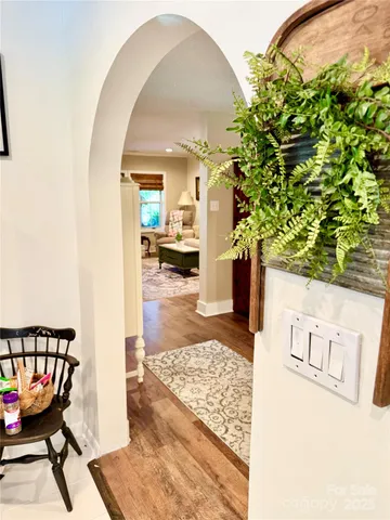 a view of a living room and a rug