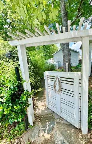 a view of a backyard with a garden