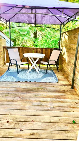 a view of a back yard of the house