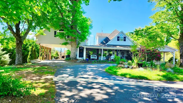 a view of a backyard of the house