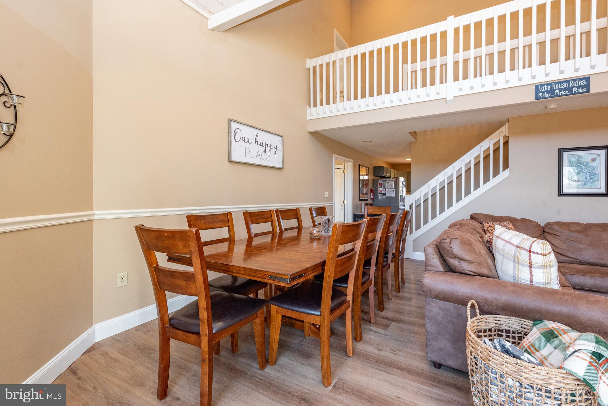 2828 Glendale Road Swanton, MD 21561 - Photo 13 of 78 a view of a dining room with furniture and wooden floor