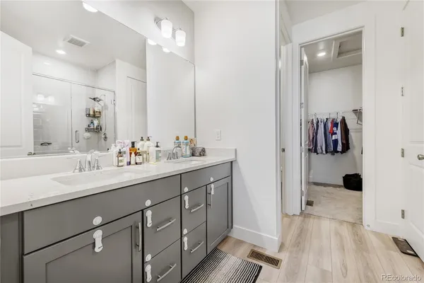 a bathroom with a sink and mirror