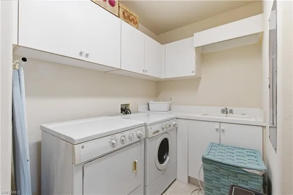 a picture of a bathroom with a sink and mirror