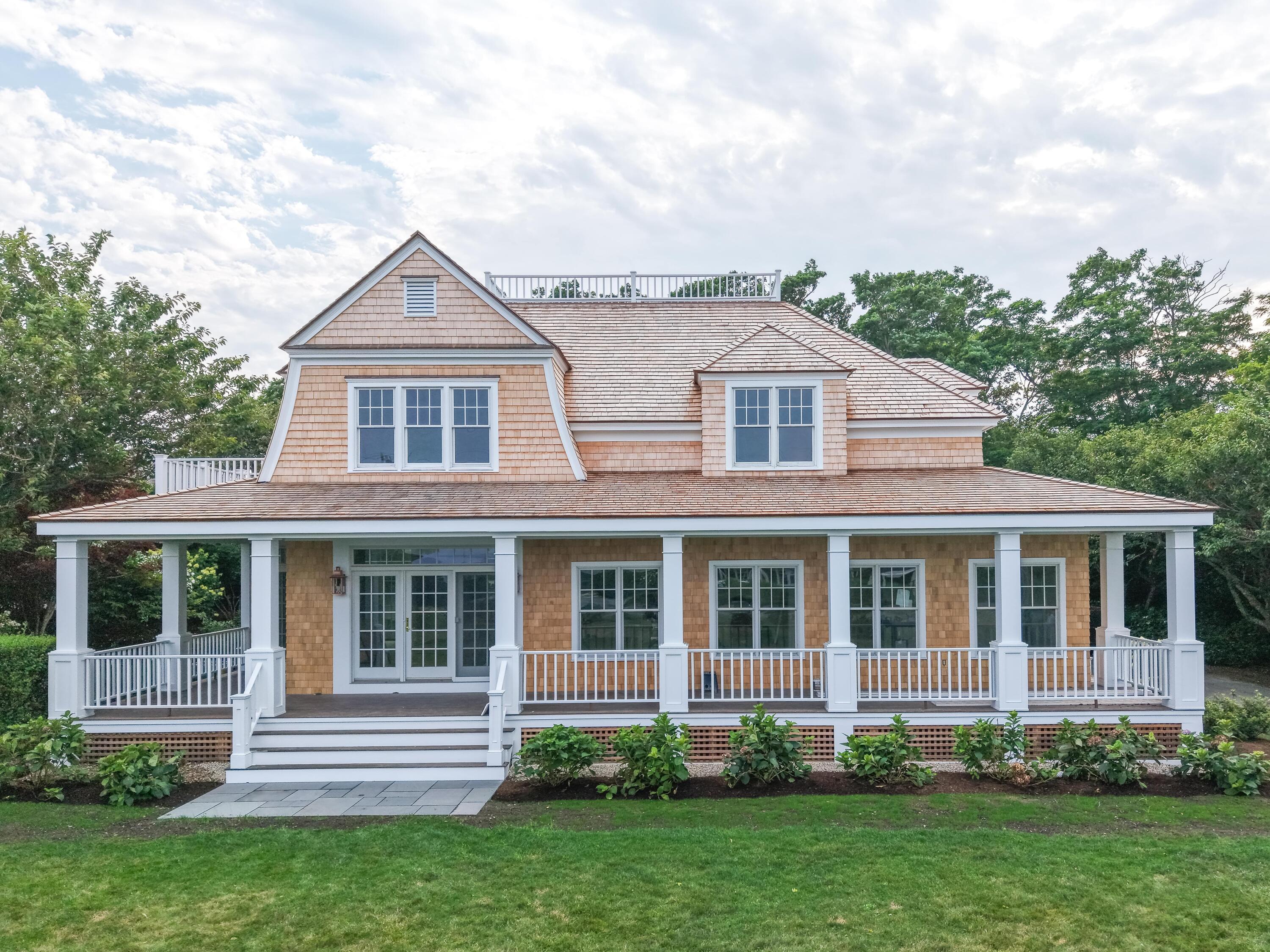 169 Shore Road Chatham, MA 02633 - Photo 1 of 16 front view of a house with a yard