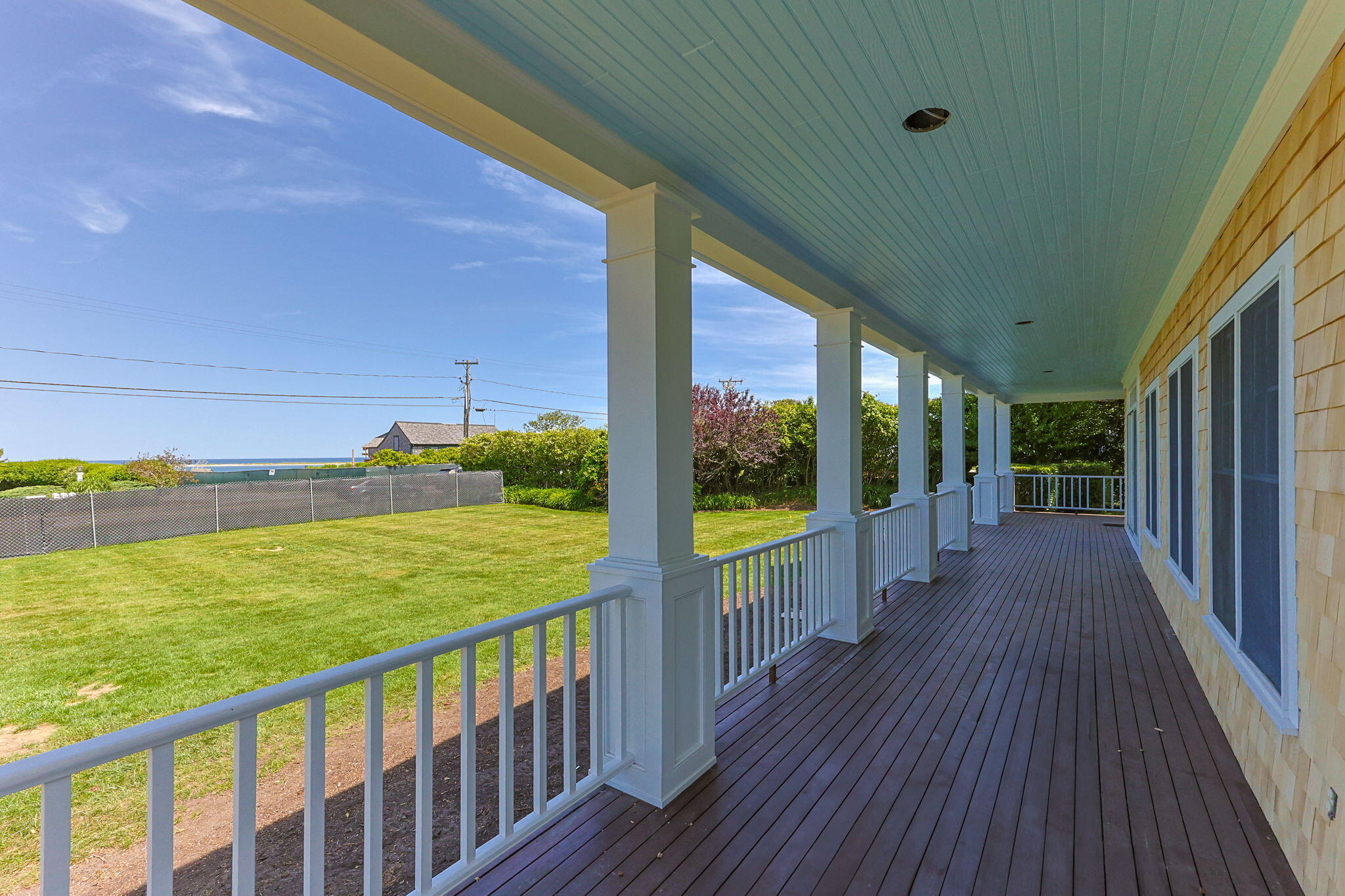 169 Shore Road Chatham, MA 02633 - Photo 6 of 16 a view of a balcony with yard