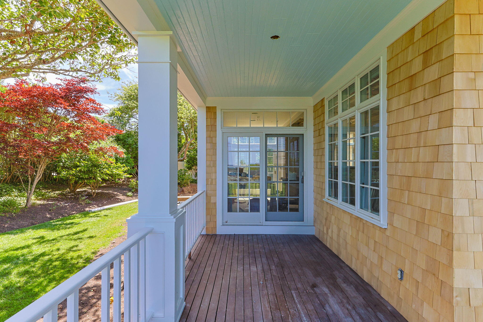 169 Shore Road Chatham, MA 02633 - Photo 7 of 16 a view of a porch with wooden floor and outdoor space