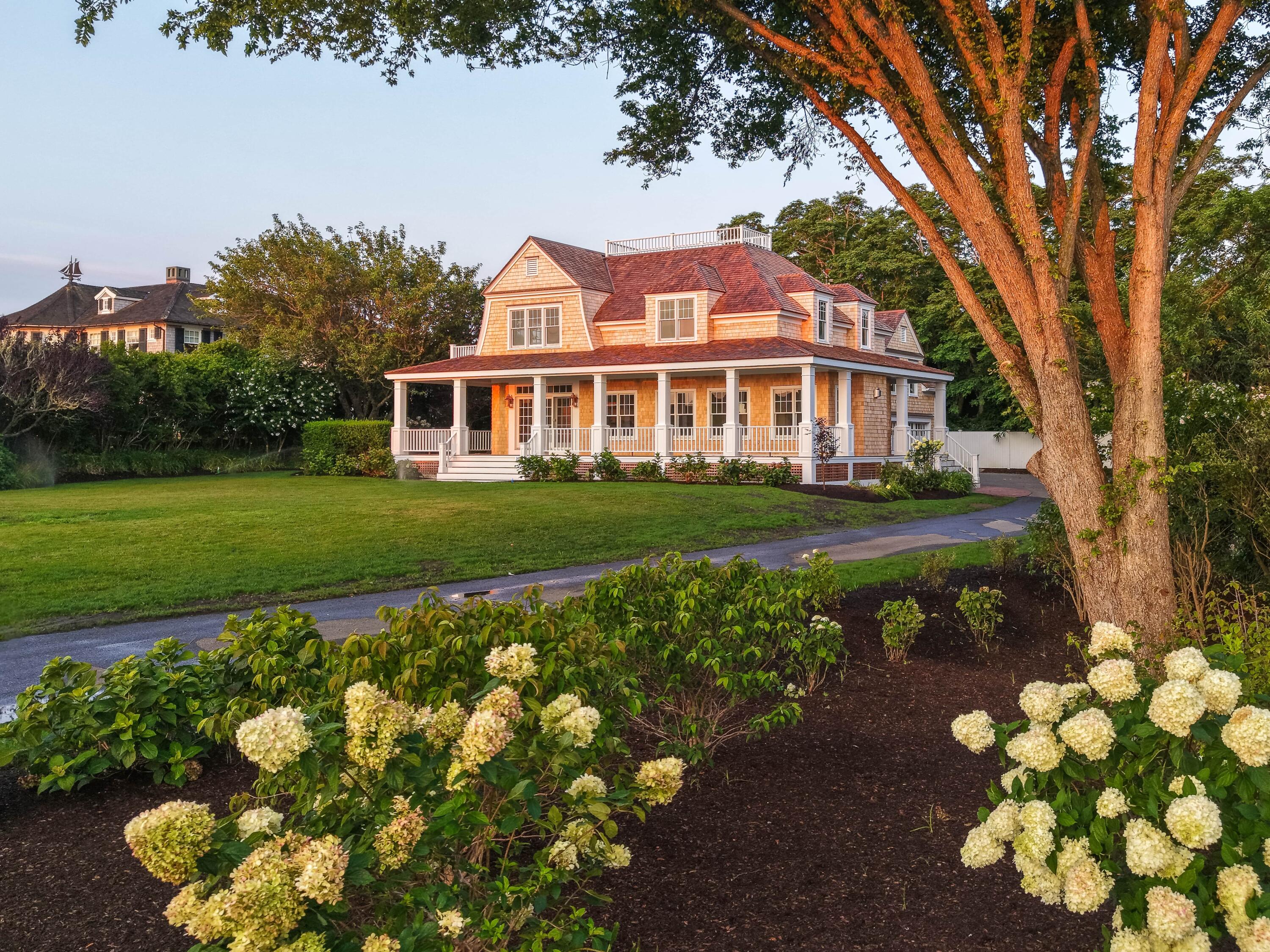 169 Shore Road Chatham, MA 02633 - Photo 8 of 16 a front view of a house with a yard