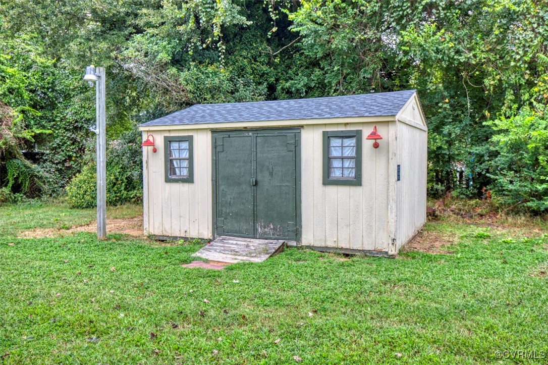 7579 Bellehaven Drive Gloucester Point, VA 23062 - Photo 13 of 13 a view of a small house with yard
