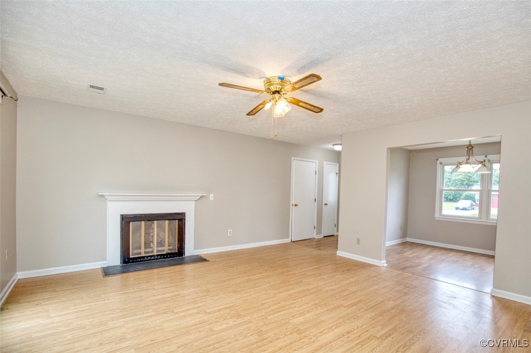 7579 Bellehaven Drive Gloucester Point, VA 23062 - Photo 8 of 13 a view of an empty room with window and wooden floor