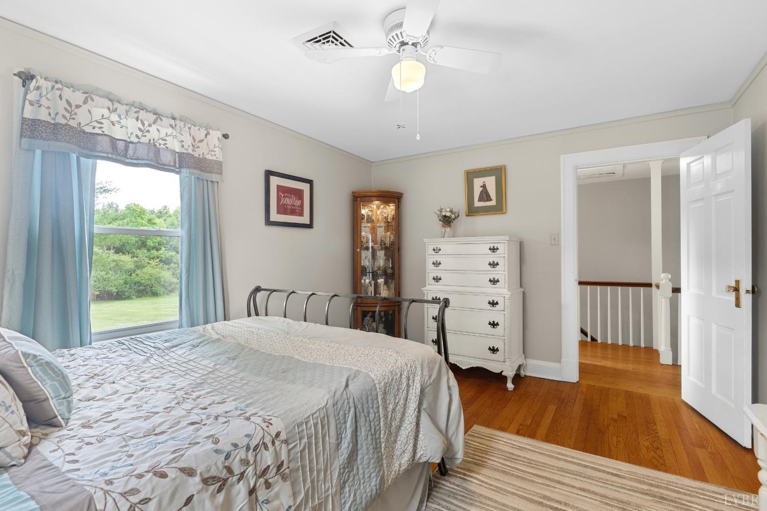 65 Phoenix Road Arrington, VA 22922 - Photo 24 of 58 a bedroom with a large bed and a window